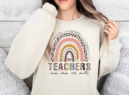 Gildan sweatshirt featuring "Teachers We Do It All" text design.