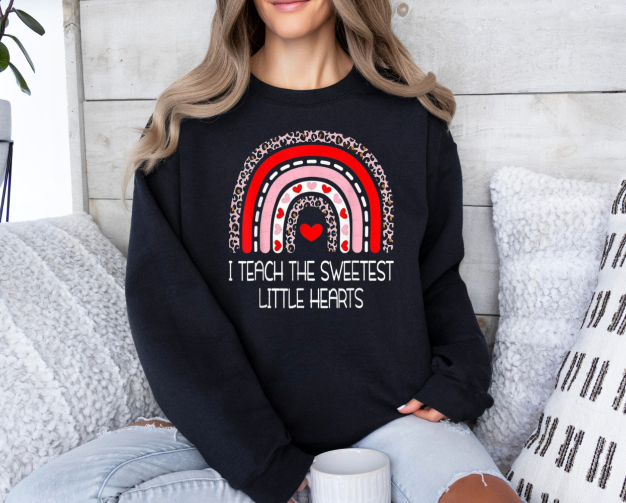 Teaching-themed Gildan sweatshirt with "I Teach The Sweetest Little Hearts" print.