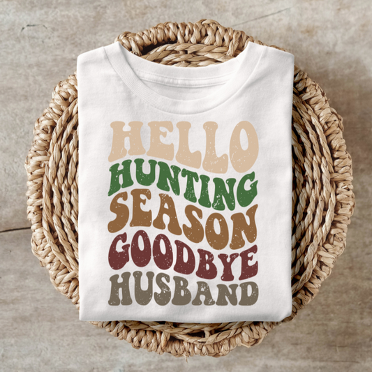 T-shirt with playful "Hello Hunting Season Goodbye Husband" text design.