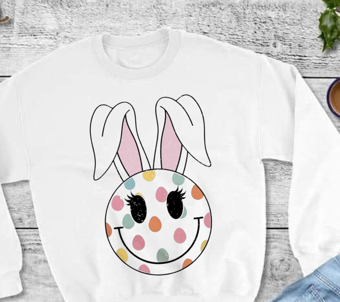 Easter Bunny sweatshirt with colorful polka dot bunny design on white Gildan fabric.