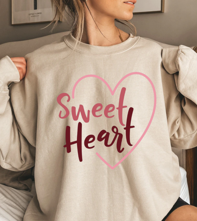 Gildan Sweet Heart sweatshirt, beige, 50/50 blend.