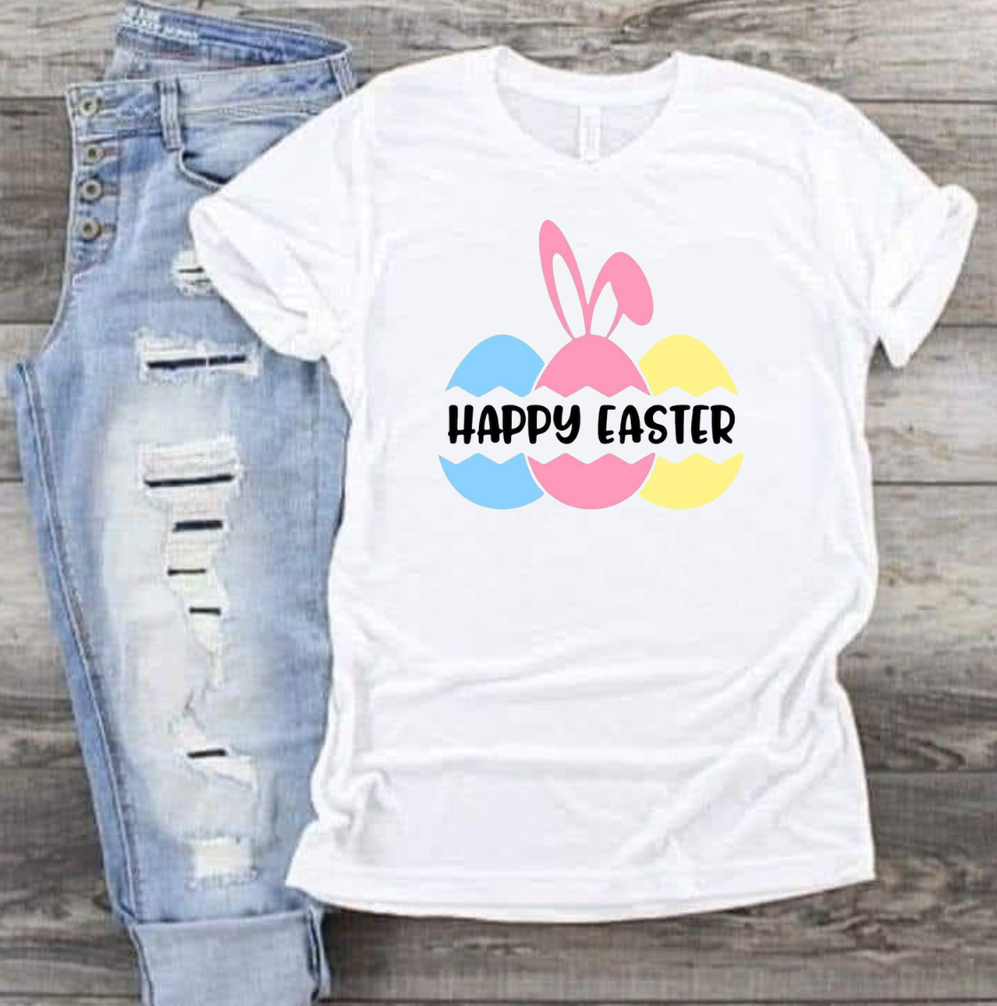 Happy Easter shirt with colorful eggs design on a white T-shirt, perfect for Easter celebrations.