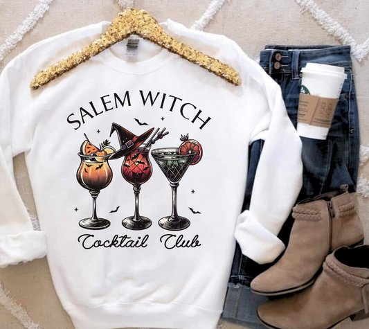 Salem Witch Cocktail Club T-shirt with spooky drink graphics, perfect for Halloween or casual wear.