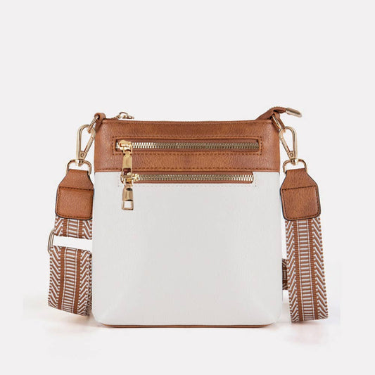 Retro contrasting PU leather crossbody bag with adjustable strap, ideal for summer travel.