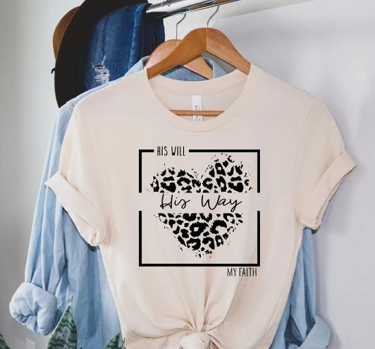 Faith-themed t-shirt with "His Will His Way My Faith" design on a hanger