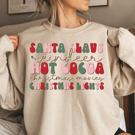 Santa Claus Hot Cocoa Christmas Lights shirt with festive design and playful Santa.